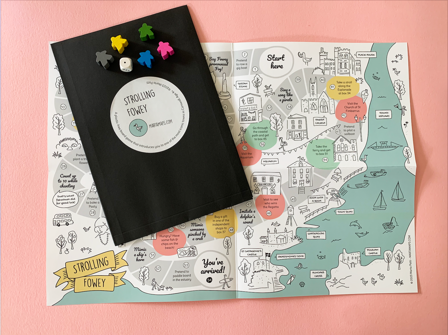 Fowey board game map pack with wooden dice and markers.