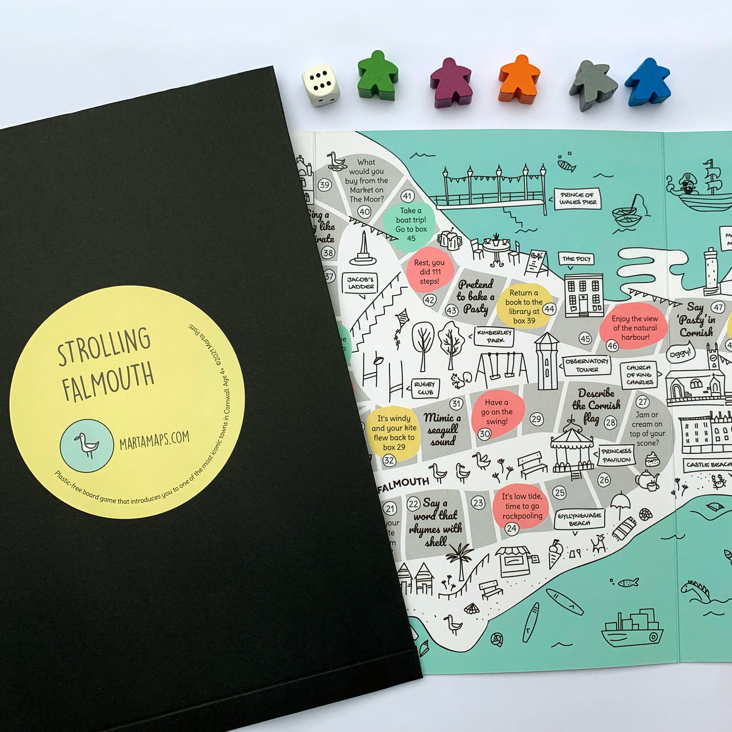 Falmouth board game map. Wooden dice and coloured markers.