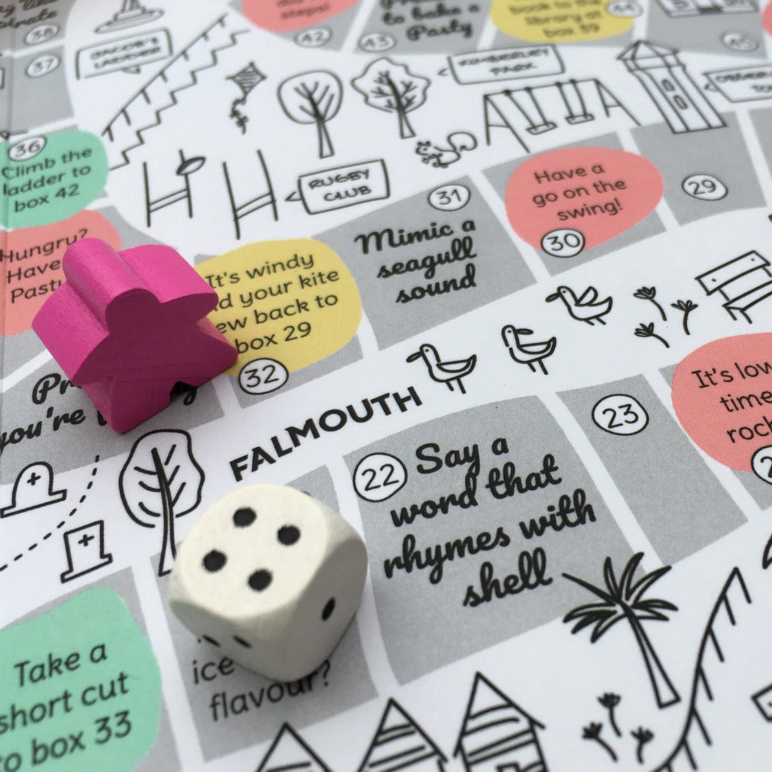 Falmouth board game with dice.