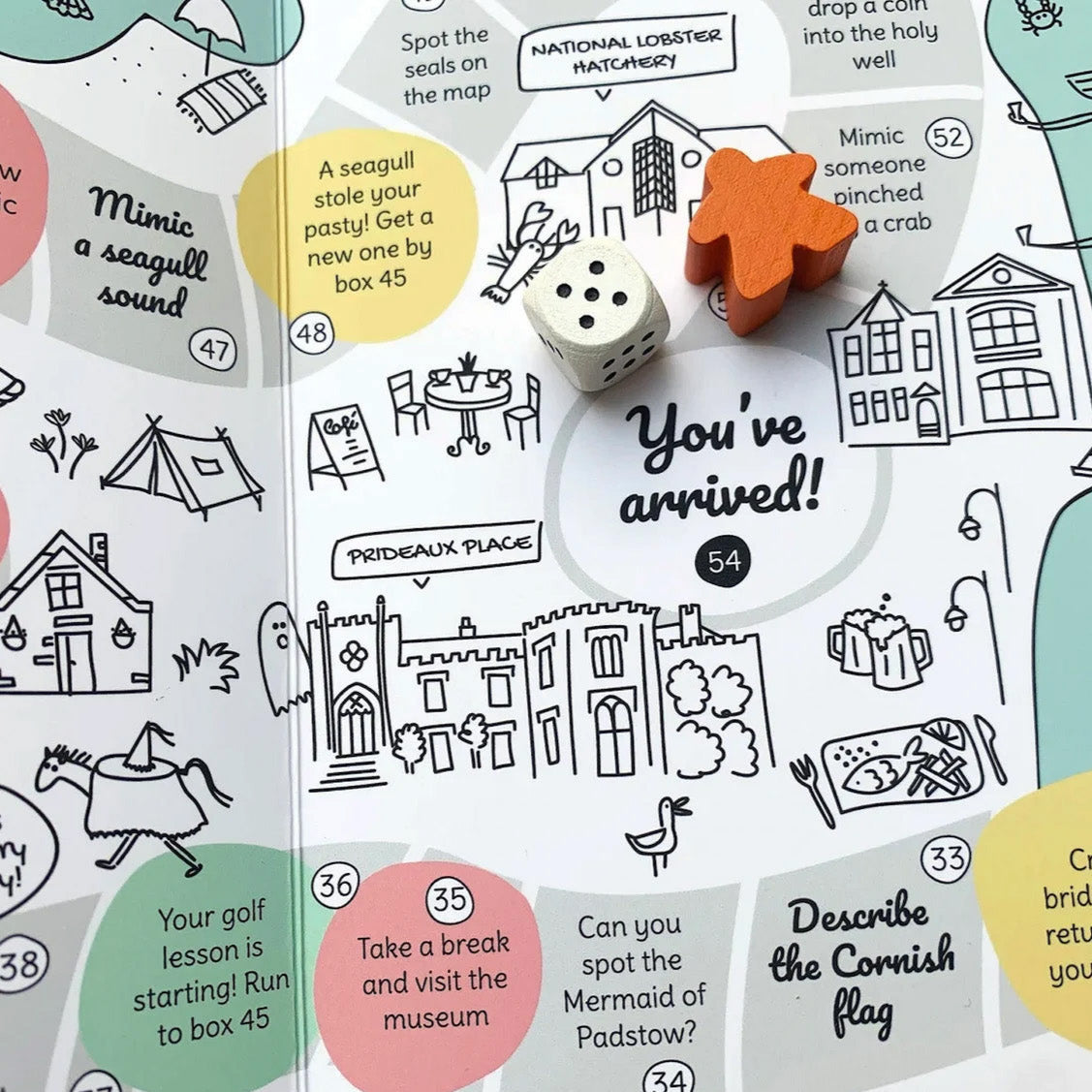 Padstow board game with wooden dice and markers. Prideaux Place