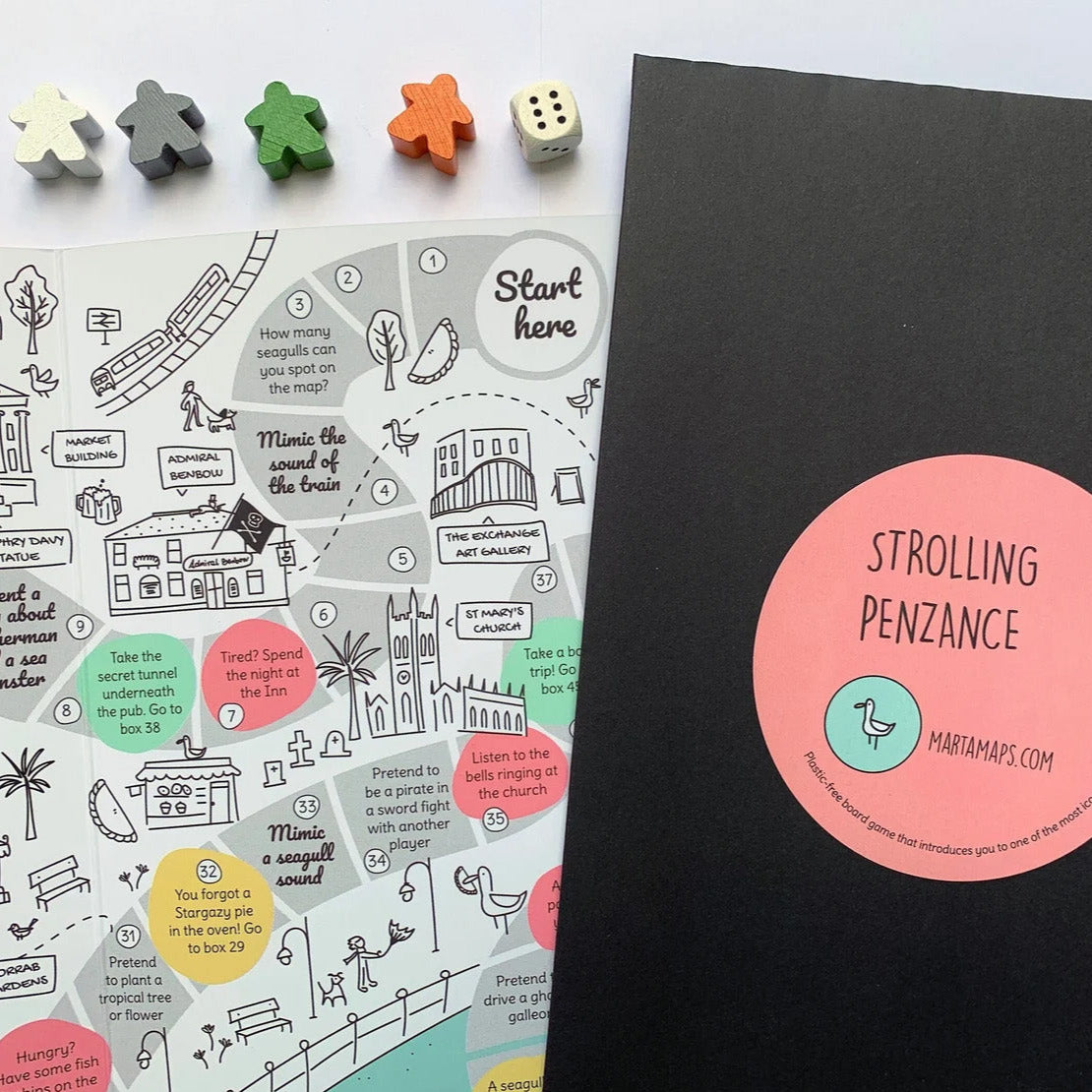 Penzance board game with wooden dice and markers.
