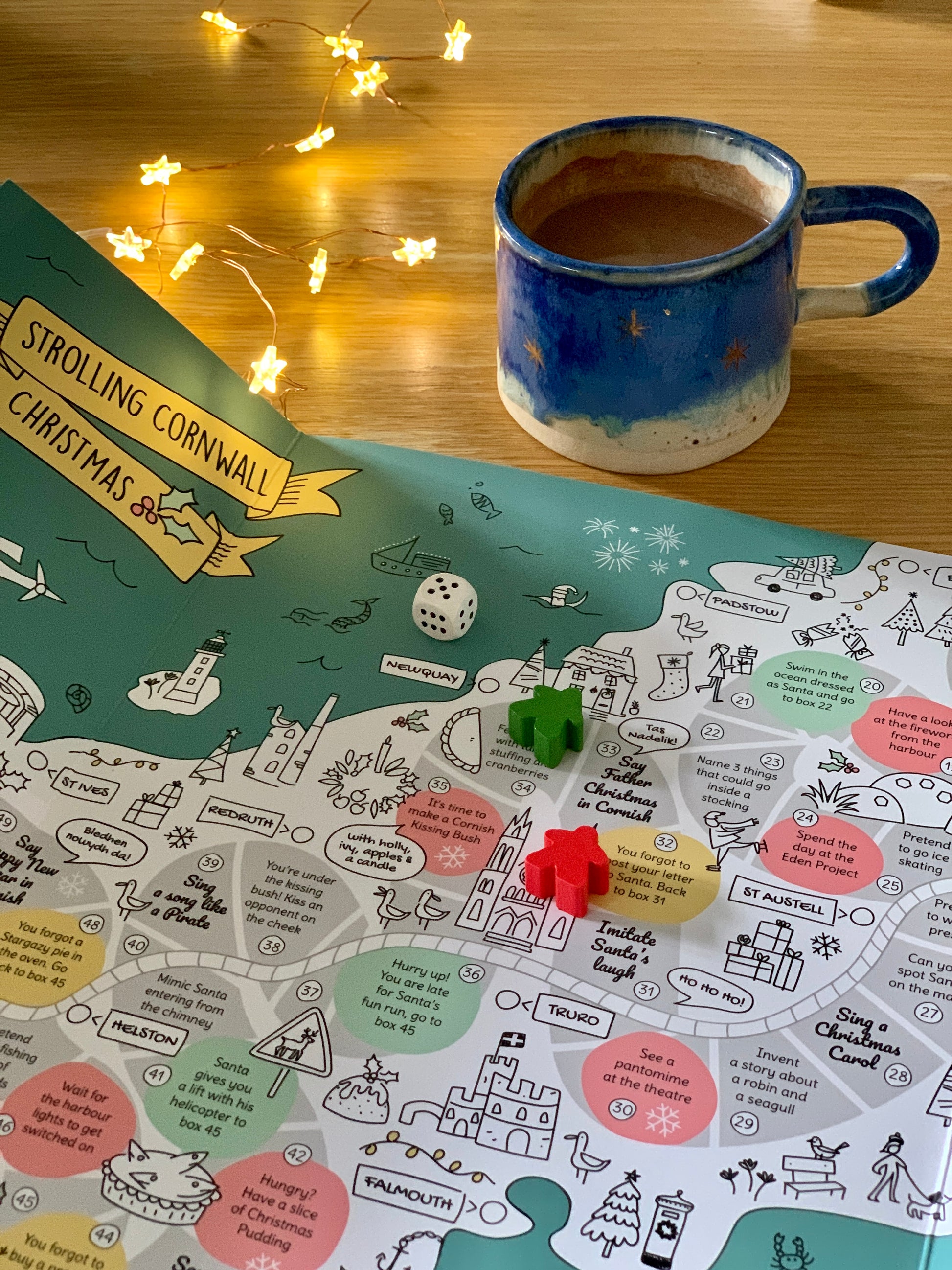 Cornwall Christmas board game with hot chocolate.