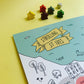 St ives board game detail with plastic free wooden and dice on yellow background.