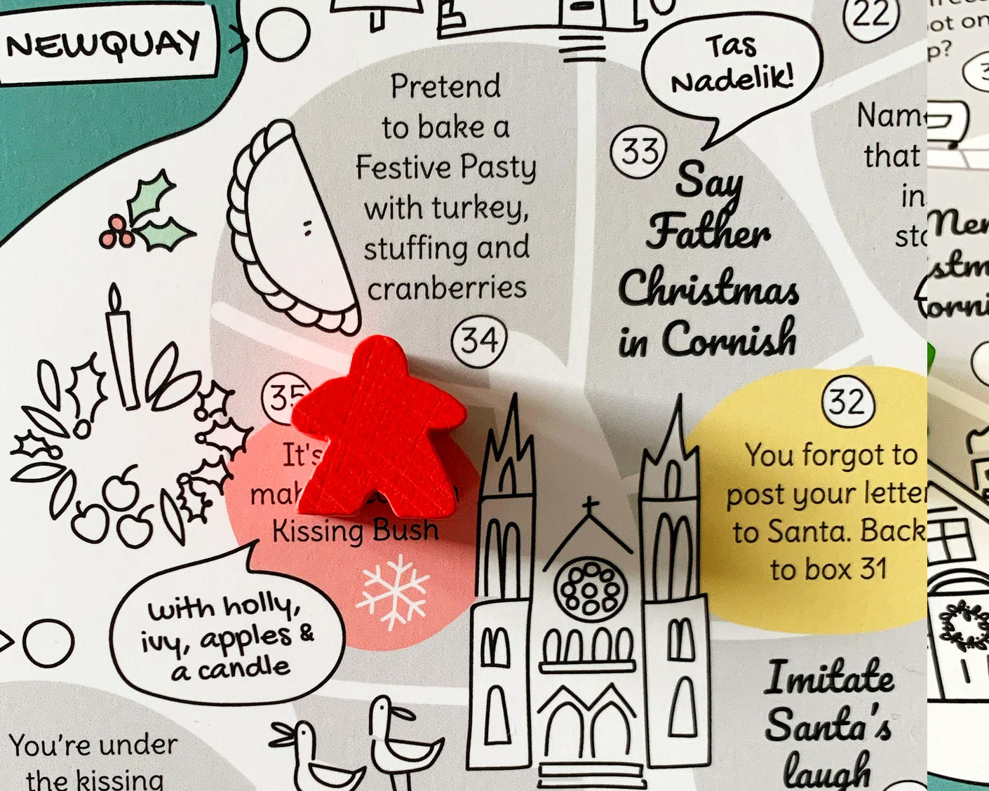 Cornwall Christmas board game detail with red wooden mark. Featuring Truro Cathedral.