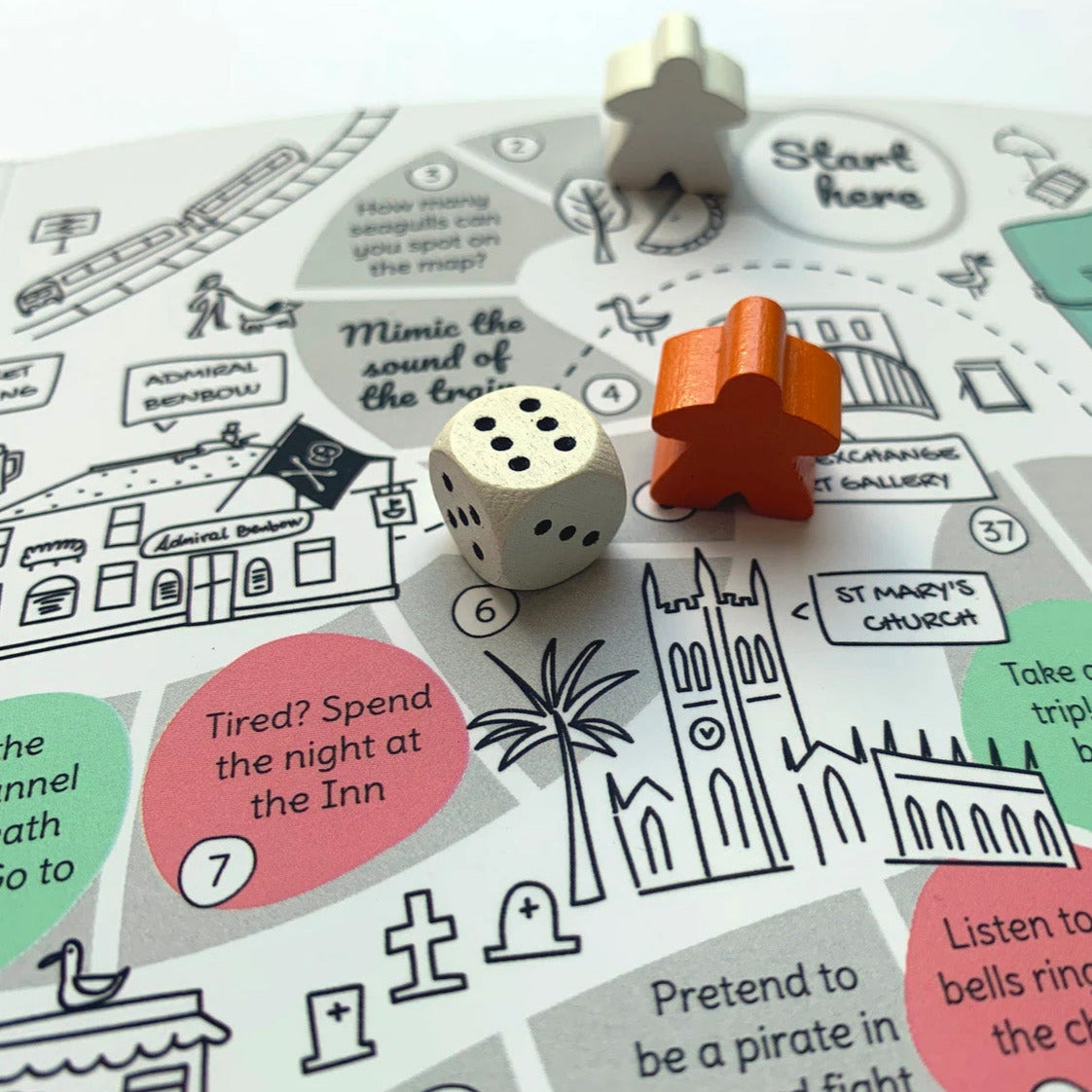 Penzance board game with wooden dice and marker